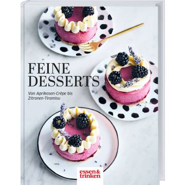 Buchcover: "Feine Desserts". Drei Himbeertörtchen mit Brombeeren und Sahne auf gepunkteten Tellern, verziert mit Lavendel. Text: "Von Aprikosen-Crêpe bis Zitronen-Tiramisu". Logo: essen & trinken.